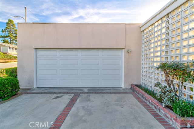 Two car garage with roll up automatic garage door