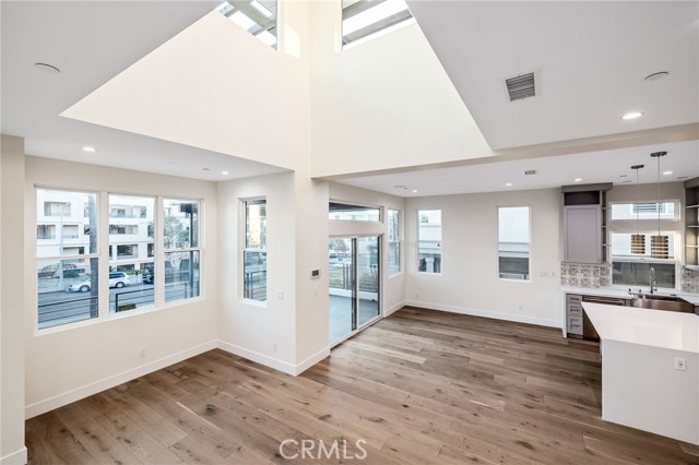 Soaring ceilings open to the loft area