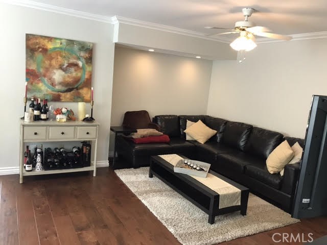 The second living room close to the dining area and between the stairway and the kitchen