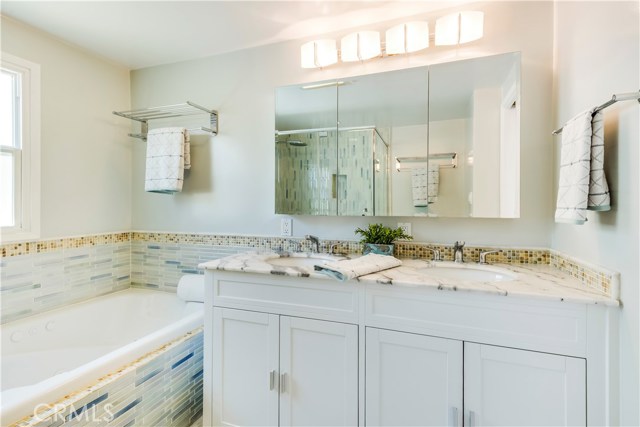 Gorgeous new master bath with tub and separate shower.