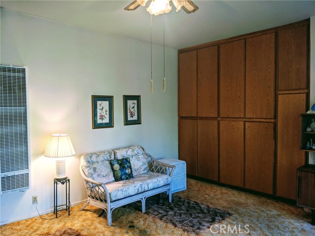 Family room on west side of house opens out to backyard and has tons of extra deep storage cabinets