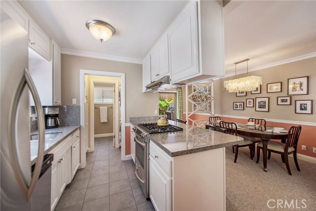 Kitchen with door to the laundry area and downstairs bathroom