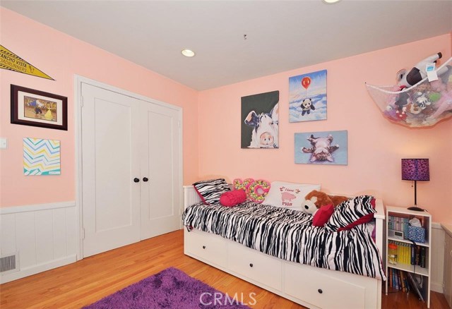 This Bedroom is a delightful and sunny upstairs room on the Entry Level