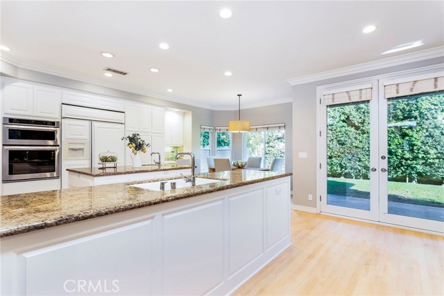 Plenty of counter space, and kitchen opens onto backyard