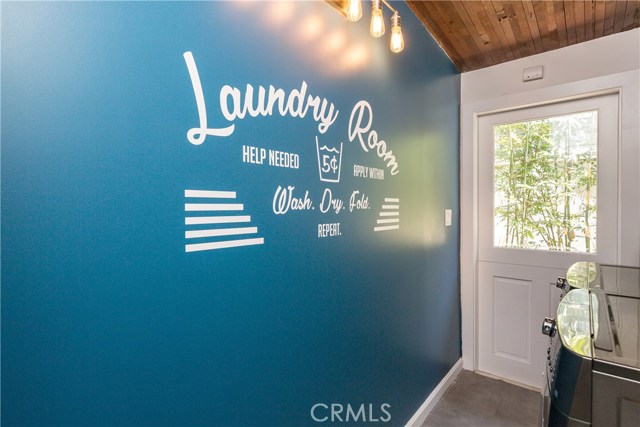 Separate laundry room with Dutch door!