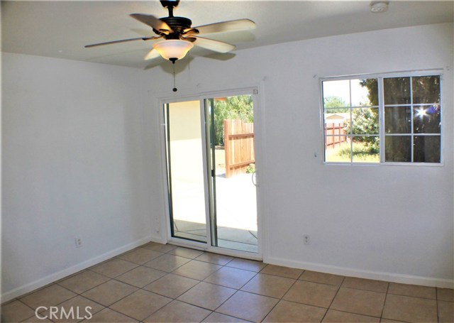 The Master Bedroom has a private patio and backyard area.