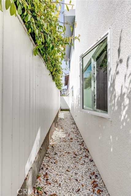 Dog run on the side of home.