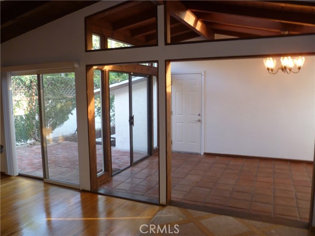 Dining Room with Vaulted Ceilings and Skylights
