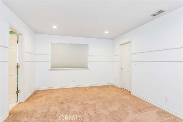 Bedroom #3 with walk-in closet, shares Jack 'n Jill bath with bedroom #2.