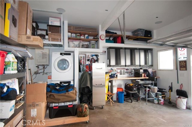 Oversized 2 car garage with washer dryer unit and tankless water heater