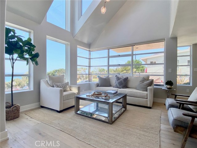 Living Room with Ocean and White Water View