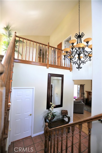 Two-story vaulted entry foyer.