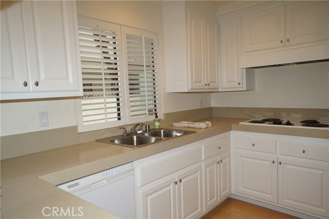 Newly updated kitchen. Kitchen window, hard wood floors, clean, sharp.