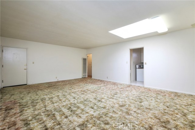 Unit B - Living Room looking at Front Door and into Hallway