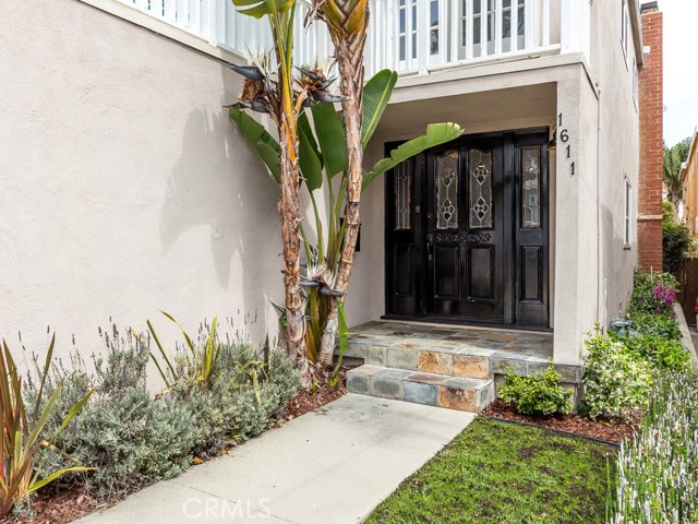 Gorgeous slate tile porch and double doors/sidelights greet you at the entry!