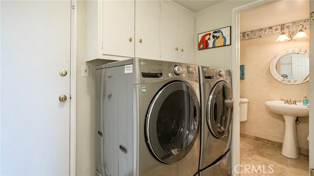 Laundry room conveniently located off kitchen and family room.