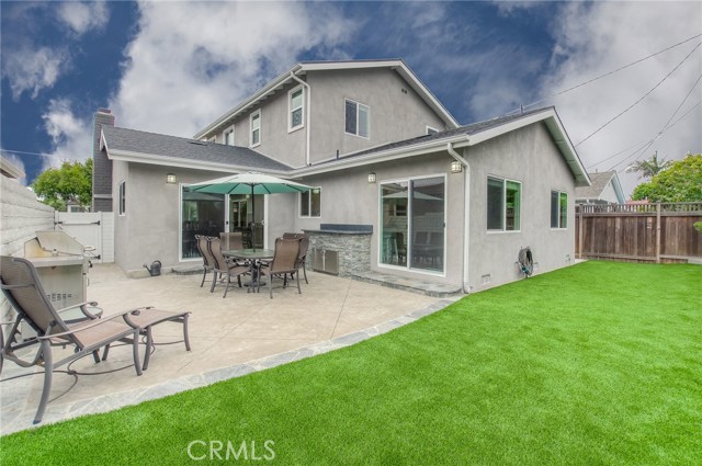 Back yard. Artificial grass for water conservation.