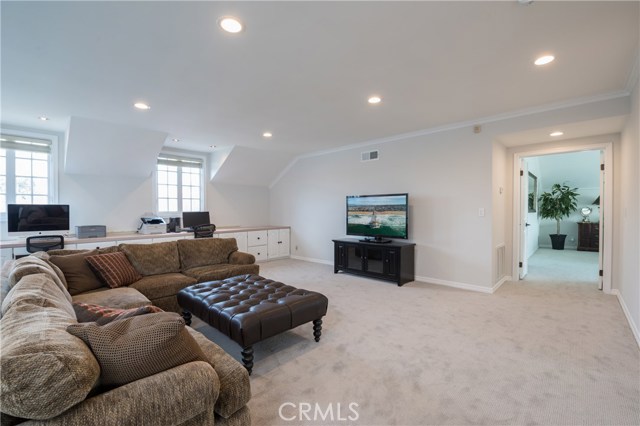 Another view of the awesome upstairs family room!  Open door leads to the wonderful master bedroom!