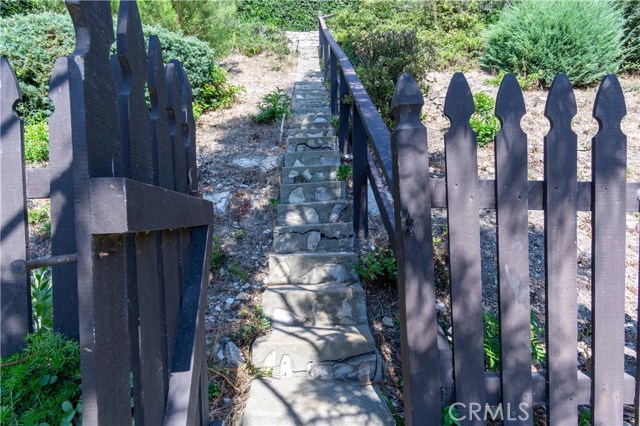 These steps will take you up to a deck with views of the Pacific Ocean, Catalina Island, and the Santa Monica mountains; weather permitting.