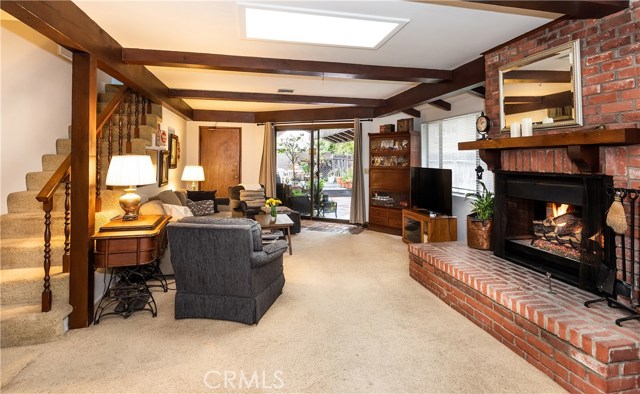 Family Room with Fireplace and Backyard Access.