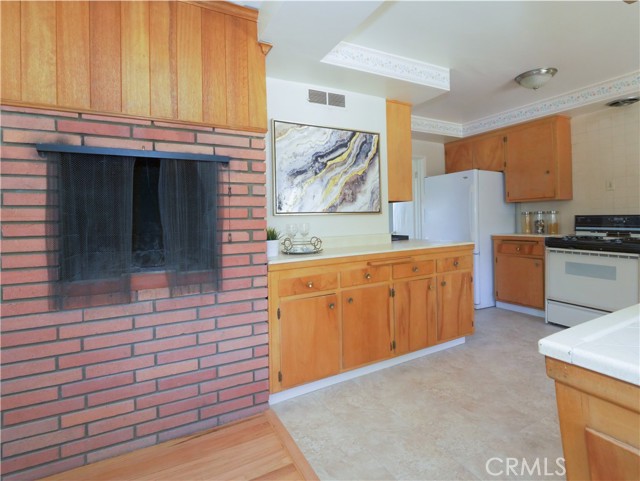 Two sided fireplace to be enjoyed from dining room too.