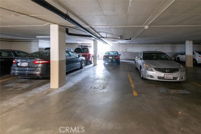 2 tandem assigned spaces in the HOA garage plus a large walk in storage closet come with this Unit.