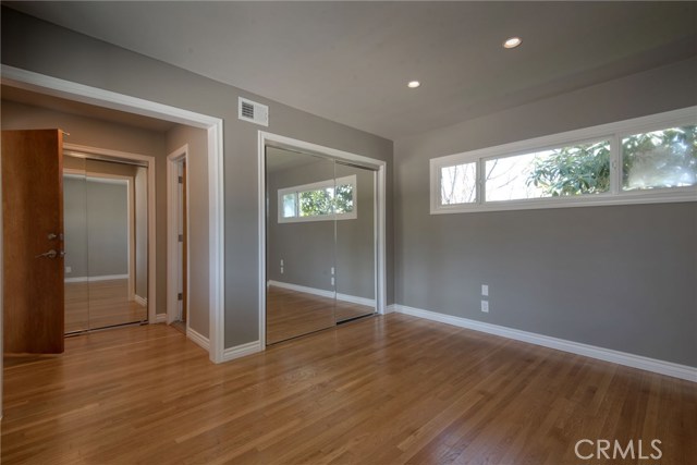 MASTER BEDROOM APPROX 13' W X 11' D) HAS TWO MIRRORED CLOSETS, ALCOVE (APPROX 4' X 4'6"), WINDOWS ON BOTH SIDES OF THE ROOM