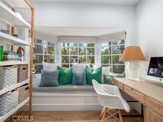 1st bedroom with bay window and bench