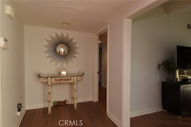 Nice formal entry opens onto the living room (to the right), and the family room/kitchen area to the left.