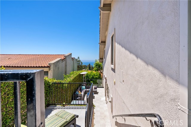 Side yard has patio as well, and connects to the kitchen!