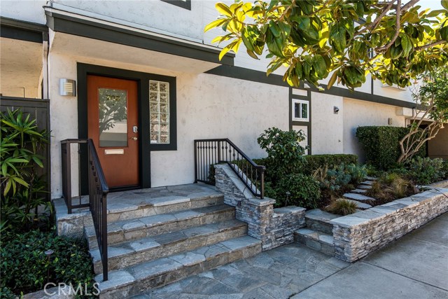 Manicured front yard, great curb appeal, owner had professional plans done with landscape architect.