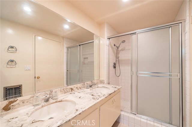 Master Bathroom with Large shower and dual sinks.