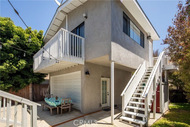 2 car garage with stairs to rear unit above