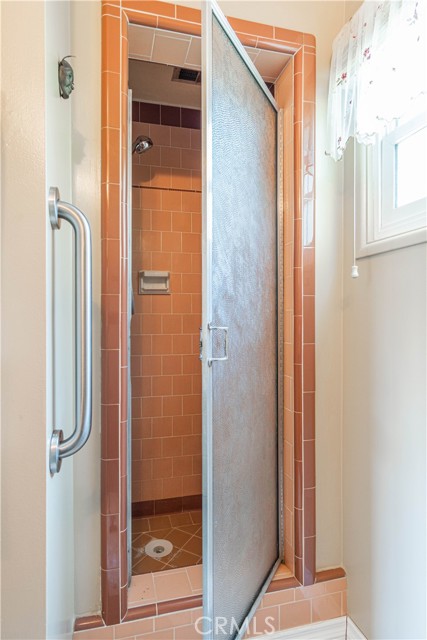 Shower stall in 3/4 bath (family room).