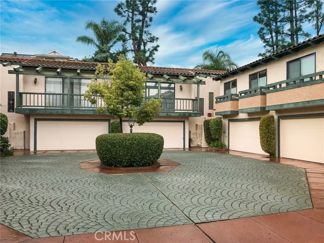 Driveway.  This townhome is in the private, right corner.