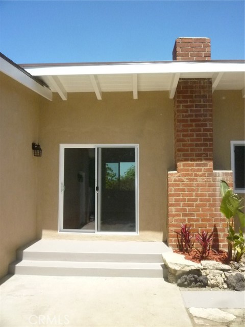 Another view of the side yard patio.