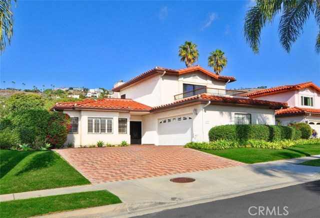 Front of freestanding home with newer roof and with view balcony