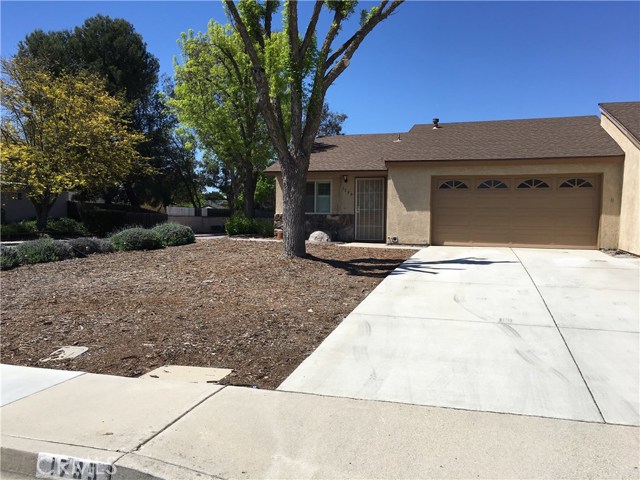 Corner lot with low maintenance landscaping near city bus and Senior Center