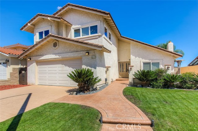 This gorgeous, 4 bedroom, 3 bath home is approximately 2,531 sq ft and features a remodeled kitchen and baths, separate family room and utility room on the second floor.