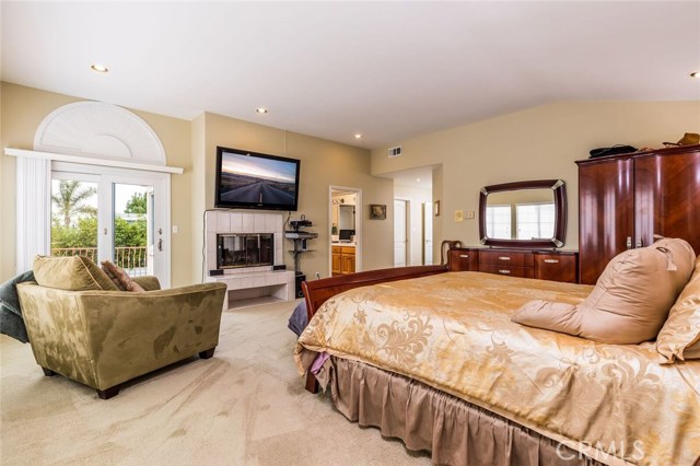 Master Suite with private patio looking towards entry and Master Bath.