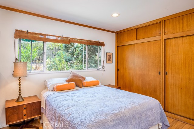 Master bedroom with custom wood closets