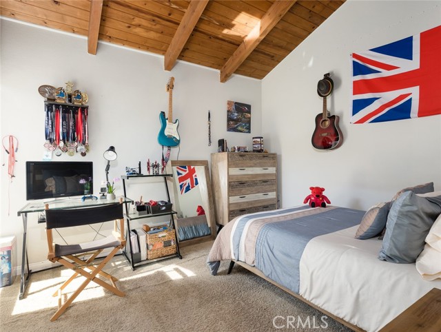 2nd bedroom with cathedral ceiling