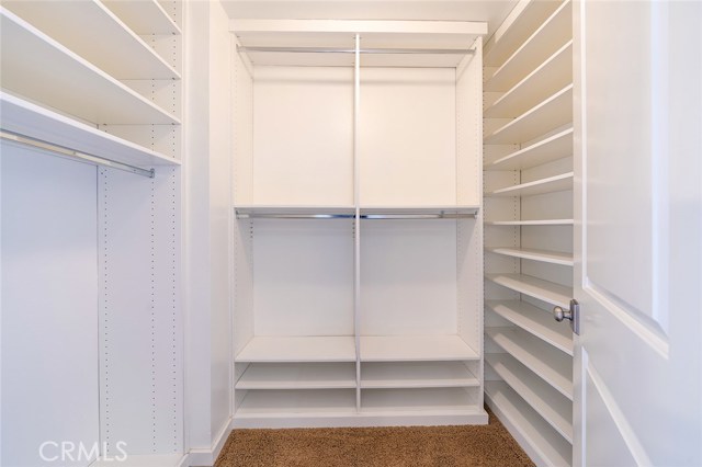 Newly expanded master walk-in closet with TONS of space!