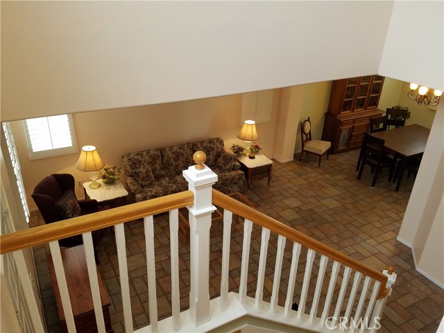 View Of Living Room And Dining Room From The Stairs.