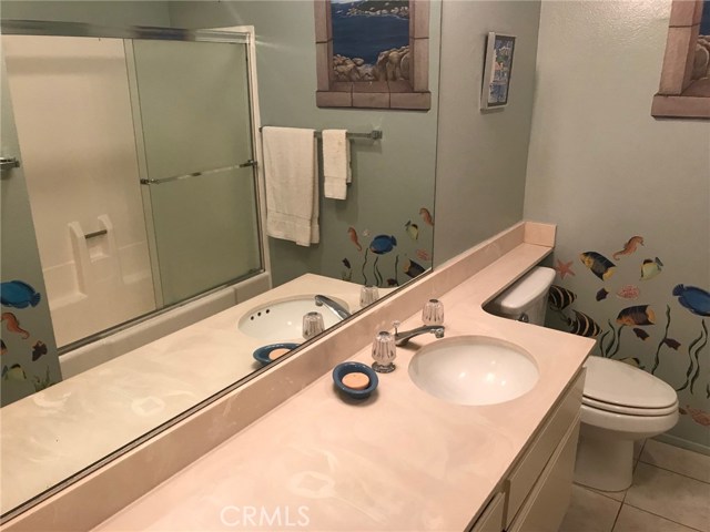 Guest Bathroom with Shower in Bathtub