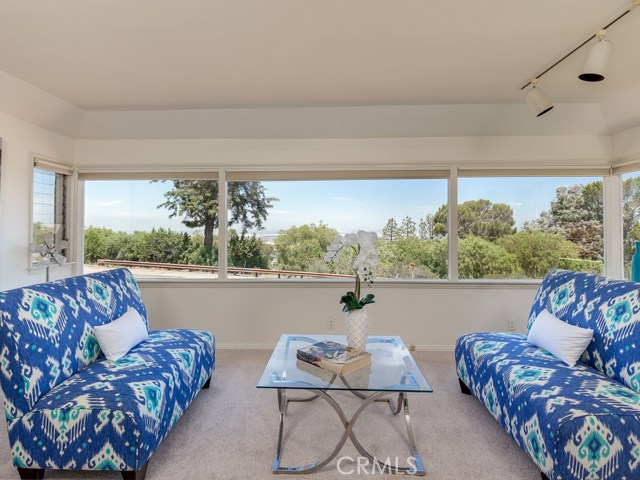 Family room with lots of natural light from the full width windows