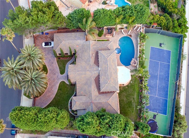 Aerial view of this amazing gated, ocean view estate with large sport court!