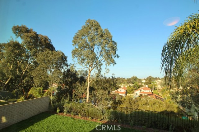 Panoramic view of mountains, city, hills.