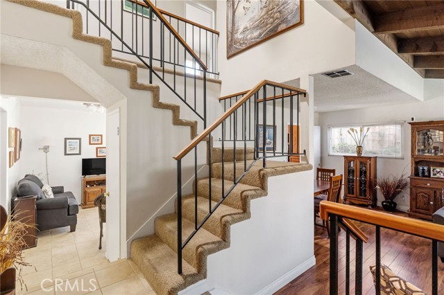 Lots of natural sunlight in this 2 level home with open staircase. One bedroom on entry level.