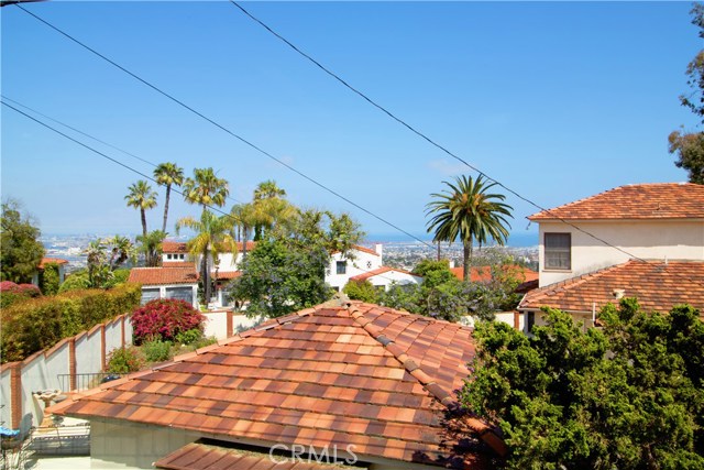 View from great room features large windows w/Harbor & City views!